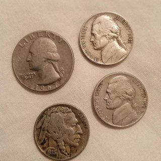 4 قطع نقدية قديمة للدولار الامريكي (٥ سنت) من سنة 1935 إلى 1971