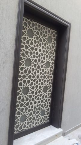 تصنيع وتركيب ابواب حديدية بجودة عالية ووتصاميم عصرية 5