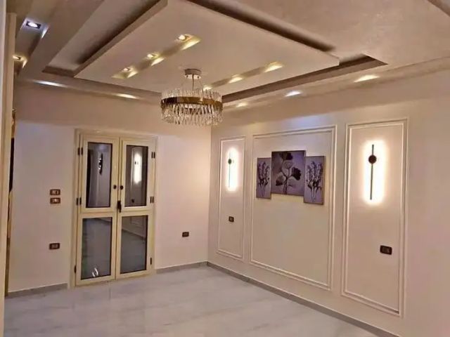 معلم دهانات وديكورات داخلية واصباغ الأبواب الخشب والحديد