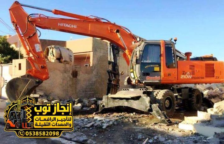بوكلين للإيجار | حفار ودقاق للإيجار | تأجير معدات الحفر والتكسير  4